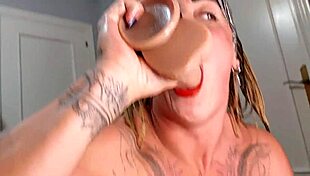 muscular milf smokes while slurping huge cock then squirts everywhere