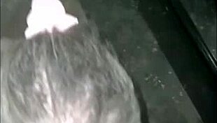 female slave sucks gloryhole cock hard