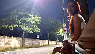 Redhead gets risky handjob at crowded bus stop