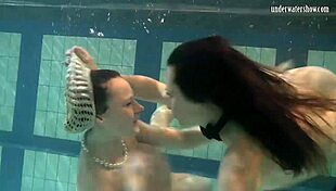 Katka Barbara's big tits bounce in underwater lesbian pussy play