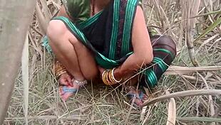 Desi village girl pisses publicly in indian outdoor toilet