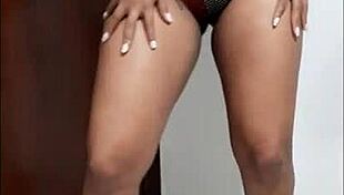 ebony babe shakes big ass to music rhythm