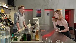 A cute girl uses her deepthroat skills on a massive cock for free drinks all night