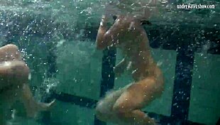 Katka Barbara's big tits bounce in underwater lesbian pussy play