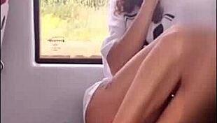 Cute coed teases with lollipop on public train ride