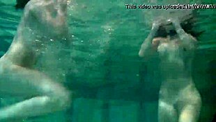 Katka Barbara's big tits bounce in underwater lesbian pussy play