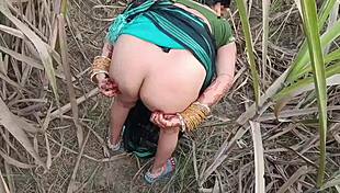 Desi village girl pisses publicly in indian outdoor toilet