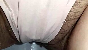 curvy pregnant milf poses in thong on toilet showing big pussy