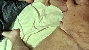 muscular stud's body flexes hard while stroking massive cock close-up with intense moans