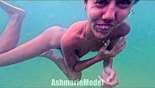 Skinny Latina babe flashes hairy pussy and small natural tits while swimming naked in pool slow motion