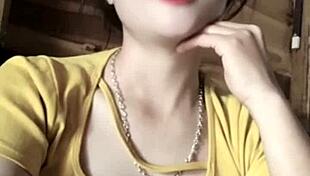 vietnamese girl sways seductively to thumping music beats in steamy club vibe