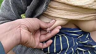 i love slapping my huge tits outdoors in the grass field