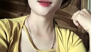 vietnamese girl sways seductively to thumping music beats in steamy club vibe