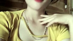 vietnamese girl sways seductively to thumping music beats in steamy club vibe