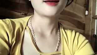 vietnamese girl sways seductively to thumping music beats in steamy club vibe