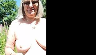 Naughty housewife dares naked outdoor walk in public