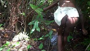 Skinny African tribe woman bends over narrow ass outdoor for ebony action?