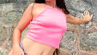 cute brunette babe flashes bikini teases dances sexy on crowded public beach