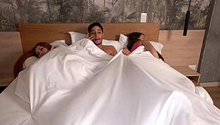 Girlfriends take turns sharing one throbbing cock right there in the same cozy bed