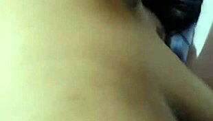 she slips into the bath, tracing her big tattooed tits seductively