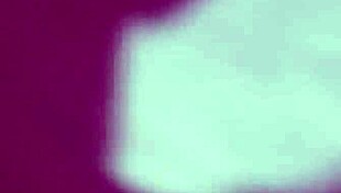 she slips into the bath, tracing her big tattooed tits seductively