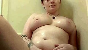 Watch me oil my chubby curves and huge tits in the steamy bath