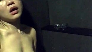 asian wife slut dildos her pussy in gym shower... watch her vibe those big nipples