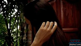 A busty brunette milf undresses slowly revealing huge softcore tits