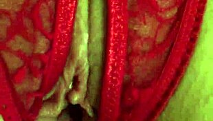 My shaved pussy drips wet in these red thongs fingering hard