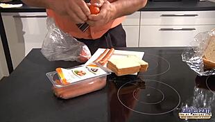 Sexy redhead sucks old man's cock then swallows his load