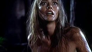 Wet beauty shows off perfect natural big tits topless posing in forest rain