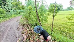 Thai babe hikes skirt flashing wet pussy on public garden trail