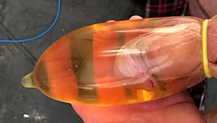 piss filled condom overflows outdoors