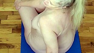 A hot milf stretches in naked yoga showing off her big tits and ass while you jerk off watching every pose
