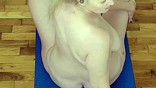 A hot milf stretches in naked yoga showing off her big tits and ass while you jerk off watching every pose