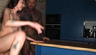 Hey, check out this tattooed guy pounding that tasty brunette's shaved pussy hardcore while she rides cowgirl!