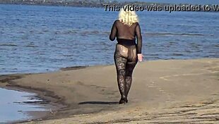 black babe flashing her big tits ass and pussy on the beach in heels 😏🏖️