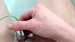 bisexual couple plays with toys under maledoms strict control