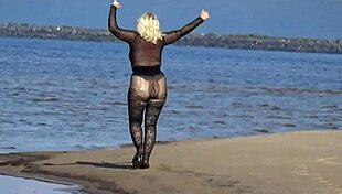 black babe flashing her big tits ass and pussy on the beach in heels 😏🏖️