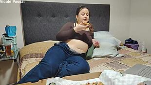 nicole's stuffing pizza then showing off that happy plump belly... wanna see?