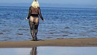 black babe flashing her big tits ass and pussy on the beach in heels 😏🏖️