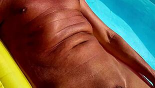 naked hunk strokes huge cock in key west public pool?