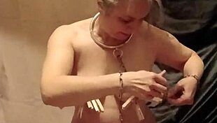 Bound French Housewife's Auto BDSM Session with Clamps Urine and Belt
