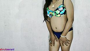 Electric thrill surges as Indian shemale in blue bikini crossdresses teasing huge tits and cock