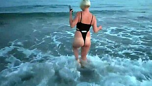 BLONDE FLASHES TITS then SUCKS COCK on crowded beach