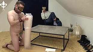 This cute tattooed femdom slave kneels in cage for cock tease cfnm bdsm art