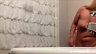 spy on this curvy babe's big tits in steamy hidden shower?