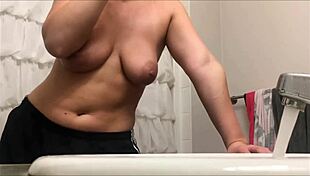 spy on this curvy babe's big tits in steamy hidden shower?