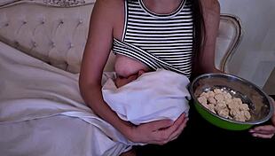 Stepmother gently breastfeeds her adult stepson in intimate roleplay moment