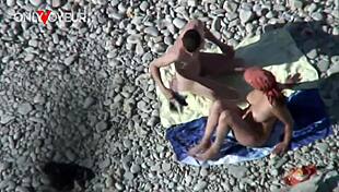 busty cougar milf flashes big natural tits on beach then bends over for young guys hard doggystyle pounding